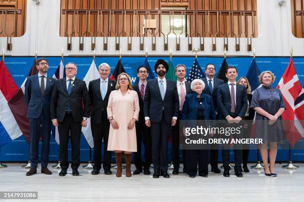 Members of the World Bank Group and Heads of Shareholder Delegations pose for a group photo during the IMF-World Bank Group spring meetings at IMF...