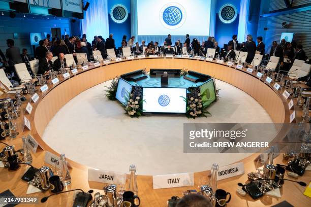 Members arrive for a meeting of the World Bank Development Committee during the IMF-World Bank Group spring meetings at World Bank headquarters in...