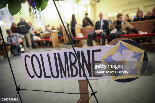 Signage for Columbine High School during a 25th Year Remembrance ceremony on April 19, 2024 at First Baptist Church of Denver in Denver, Colorado....