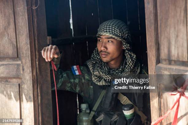 Kndf A soldier from the Karenni Nationalities Defence Force sits at the ...