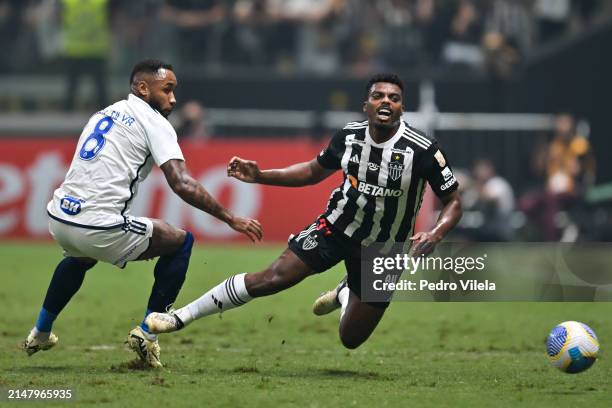 Jemerson of Atletico Mineiro and Rafa Silva of Cruzeiro fight for the ball during a match between Atletico Mineiro and Cruzeiro as part of...