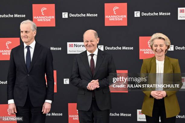 German Chancellor Olaf Scholz , European Commission President Ursula von der Leyen and Norway's Prime Minister Jonas Gahr Store pose for photos prior...