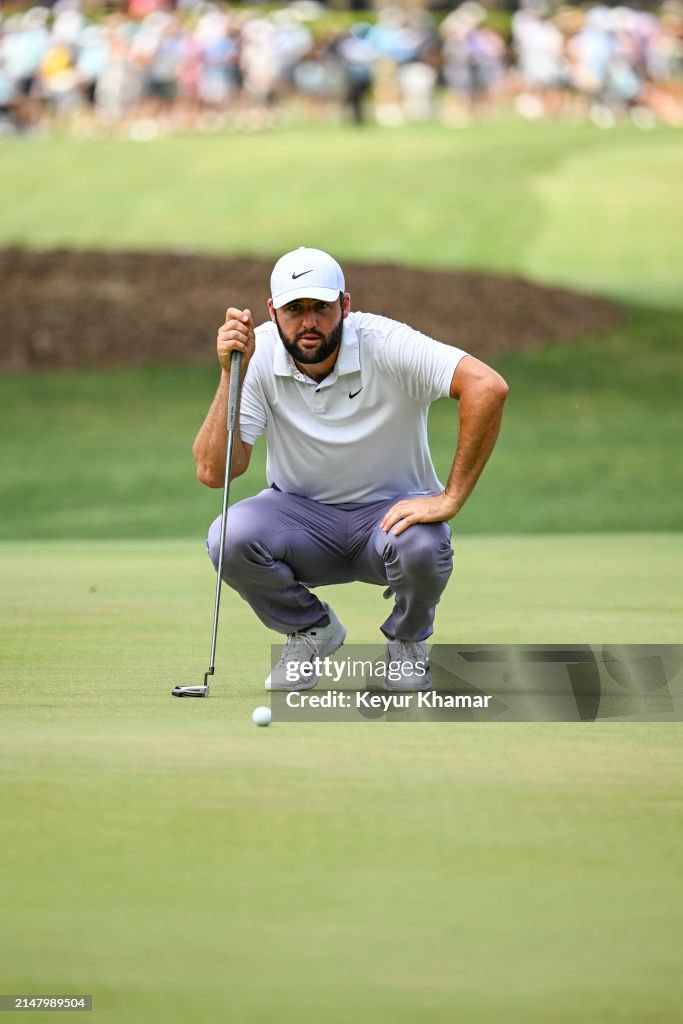 Scottie Scheffler reads his putt on the 10th hole green during the ...