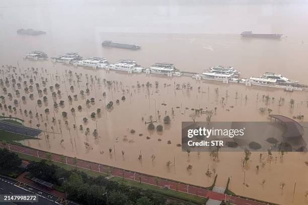 General view of a submerged street after heavy rains in Qingyuan City, in China's southern Guangdong Province on April 22, 2024. / China OUT