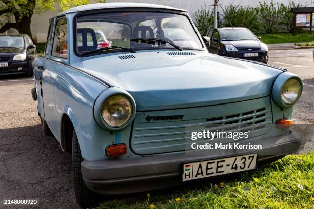 Parked Trabant 1.1 car is pictured on 7th April 2024 in Sarospatak, Hungary. The 4-stroke Trabant 1.1 is the rarest Trabant model, with just 39,474...