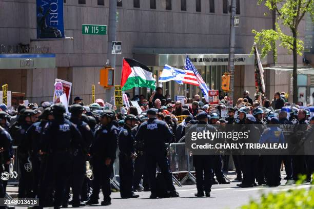 Pro-Palestinian and Pro-israel face off outside of Columbia University which is occupied by Pro-Palestinian protesters in New York on April 22, 2024....