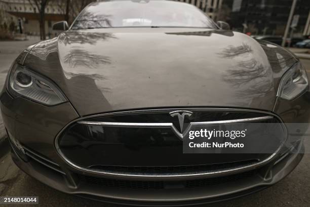 Tesla car parked in downtown Edmonton, on April 20 in Edmonton, Alberta, Canada.