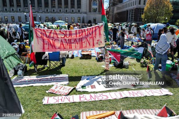 People rally on the campus of Columbia University which is occupied by pro-Palestinian protesters in New York on April 22, 2024. US President Joe...
