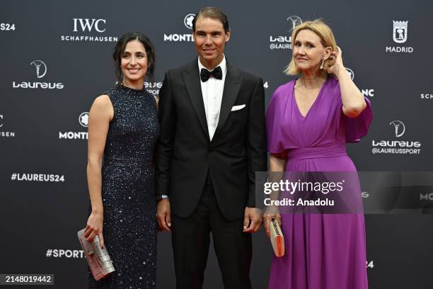 Spanish tennis player Rafael Nadal , his wife Maria Francisca Perello and his mother Ana Maria Parera attend the red carpet at the 2024 Laureus World...