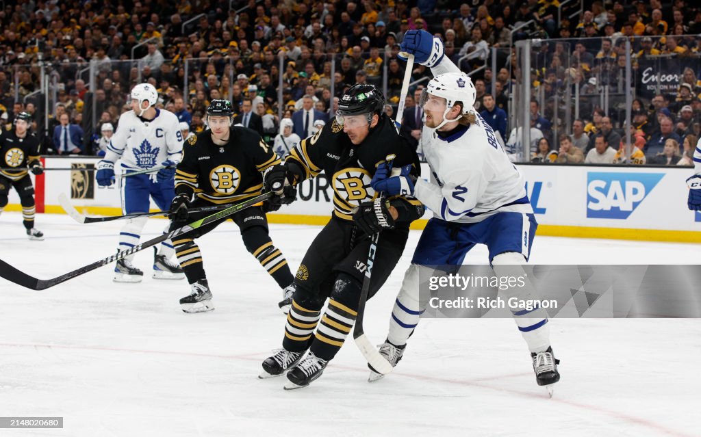 Simone Benoit Simon Benoit of the Toronto Maple Leafs checks Brad Marchand of the ...