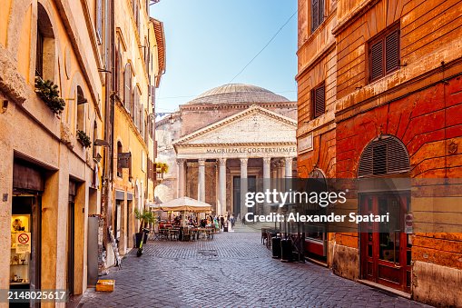 Pantheon seen through the streets of Rome old town on a sunny day, Italy Pantheon seen through the streets of Rome old town on a sunny day, Italy