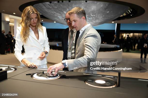 Gisele Bündchen and IWC Schaffhausen CEO Chris Grainger-Herr at the IWC Schaffhausen booth at Watches and Wonders Geneva on Tuesday, April 9, 2024 in...