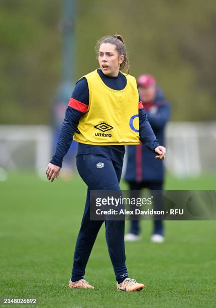 Holly Aitchison runs with the ball during a England Red Roses Training Session at Pennyhill Park on April 09, 2024 in Bagshot, England.