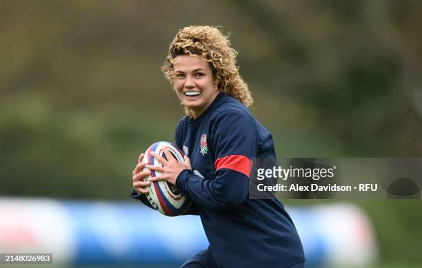Ellie Kildunne runs with the ball during a England Red Roses Training Session at Pennyhill Park on April 09, 2024 in Bagshot, England.