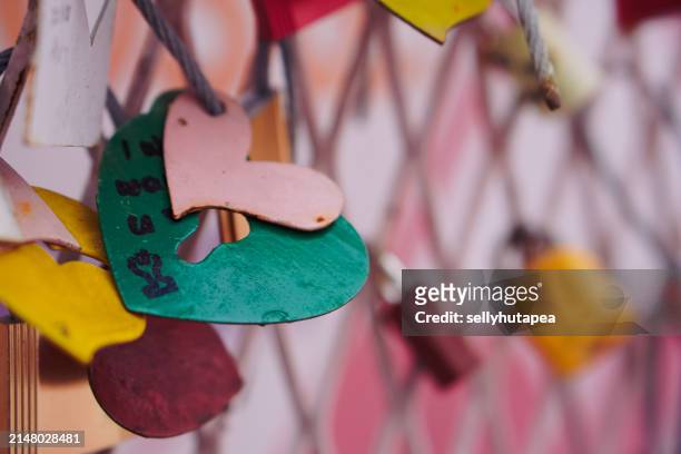 variety of padlocks hanging on a fence. love concept - mail stock illustrations stock pictures, royalty-free photos & images
