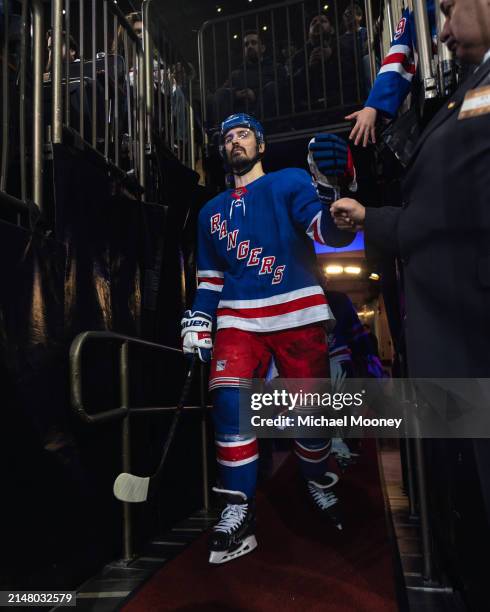 Chris Kreider of the New York Rangers walks to the ice before the start of the third period during a game against the Philadelphia Flyers at Madison...
