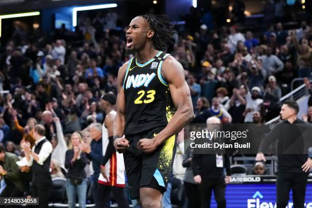 Aaron Nesmith of the Indiana Pacers celebrates after beating the Miami Heat 117-115 at Gainbridge Fieldhouse on April 07, 2024 in Indianapolis,...