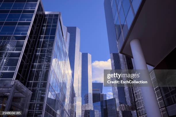 composition of modern office buildings and blue sky with clouds - western europe stock pictures, royalty-free photos & images