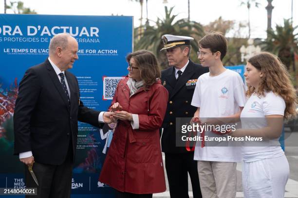 Prince Albert II of Monaco , and the Minister for External Action and the EU, Meritxell Serret , during the opening of the exhibition 'It's Time to...