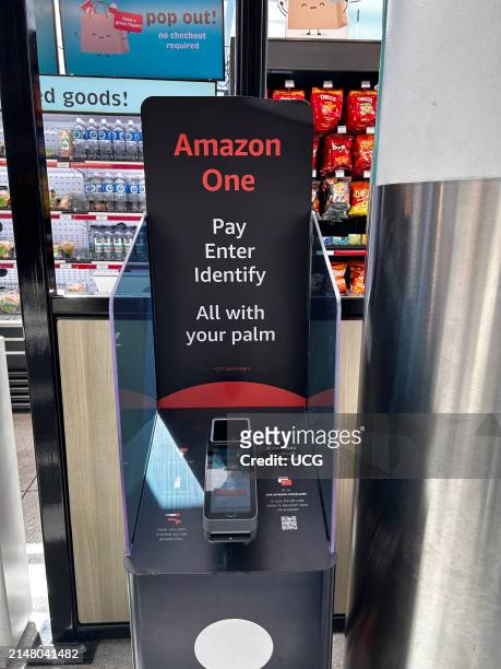 Goods Express, Amazon One kiosk, Pay enter identify with palm of hand, automated store in Charlotte International Airport with 3D interactive sign,...