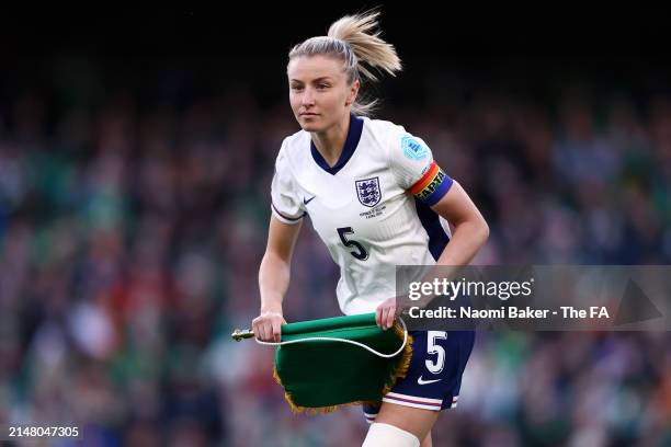 Leah Williamson of England looks on whilst holding the match pennant prior to the UEFA Women's European Qualifier match between Republic of Ireland...