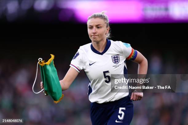 Leah Williamson of England looks on whilst holding the match pennant prior to the UEFA Women's European Qualifier match between Republic of Ireland...