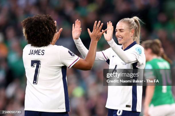 Alex Greenwood of England celebrates scoring her team's second goal with Lauren James during the UEFA Women's European Qualifier match between...