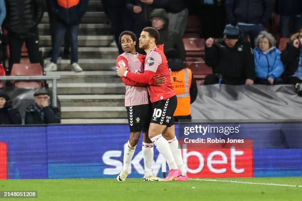 Kyle Walker-Peters of Southampton celebrates after he scores a goal to make it 1-0 with team-mate Che Adams during the Sky Bet Championship match...