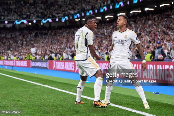 Rodrygo Silva De Goes of Real Madrid celebrates with teammate Vinicius Junior after scoring his team's second goal during the UEFA Champions League...