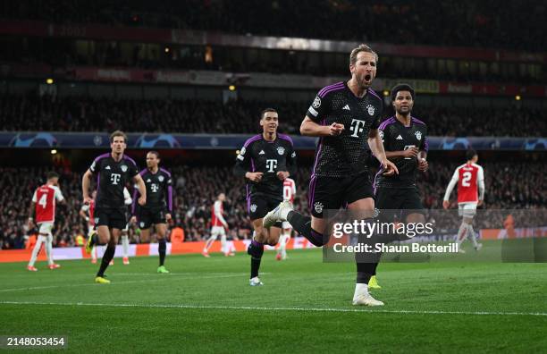 Harry Kane of Bayern Munich celebrates scoring his team's second goal from a penalty during the UEFA Champions League quarter-final first leg match...