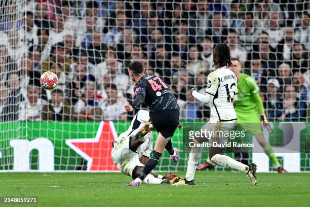 Phil Foden of Manchester City scores his team's second goal during the UEFA Champions League quarter-final first leg match between Real Madrid CF and...