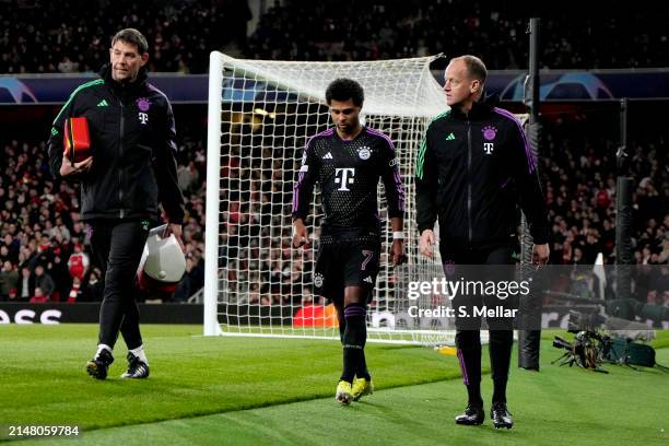 Serge Gnabry of Bayern Munich walks around the pitch after being substituted off during the UEFA Champions League quarter-final first leg match...