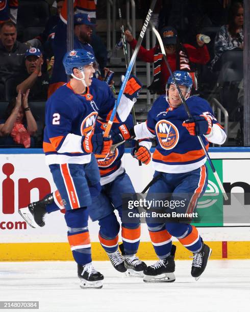 Mike Reilly of the New York Islanders celebrates his first period goal against the New York Rangers at UBS Arena on April 09, 2024 in Elmont, New...