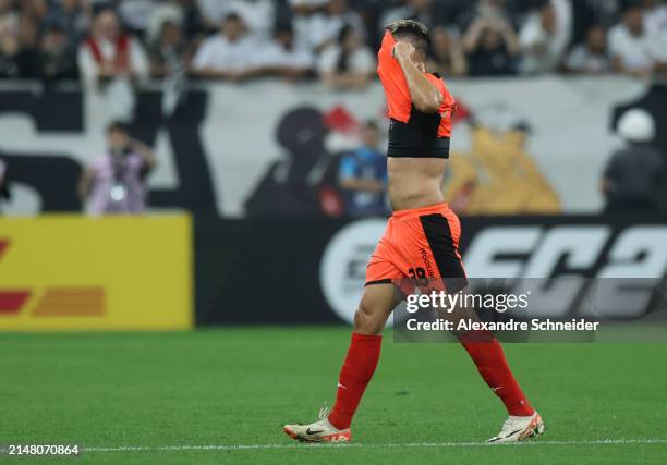 Fredy Arevalo of Nacional leaves the field after receiving the red card during a match between Corinthians and Nacional as part of Copa CONMEBOL...