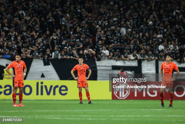 Players of Nacional react after losing the Group F match between Corinthians and Nacional as part of Copa CONMEBOL Sudamericana 2024 at Neo Quimica...