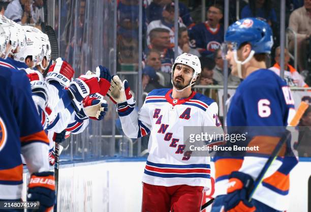 Chris Kreider of the New York Rangers celebrates his powerplay goal against the New York Islanders at 7:47 of the second period at UBS Arena on April...