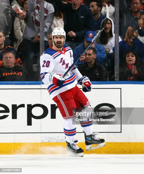 Chris Kreider of the New York Rangers celebrates his powerplay goal against the New York Islanders at 7:47 of the second period at UBS Arena on April...