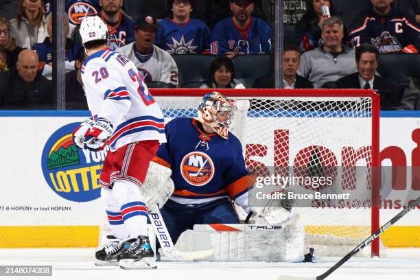 Chris Kreider of the New York Rangers scores a powerplay goal against the New York Islanders at 7:47 of the second period at UBS Arena on April 09,...