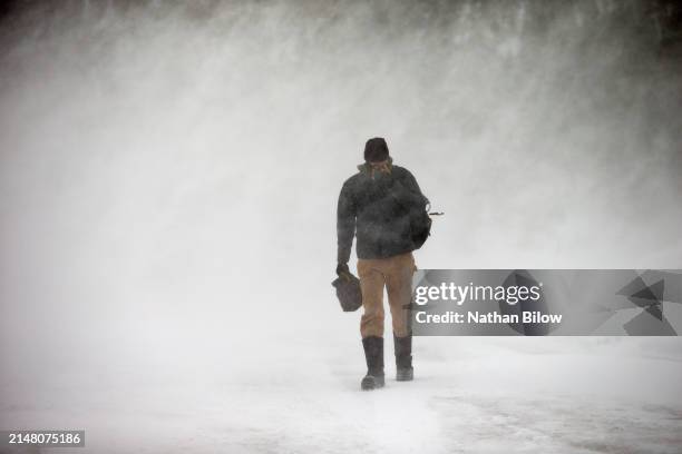 winter snow blizzard - walking in snow storm stock pictures, royalty-free photos & images