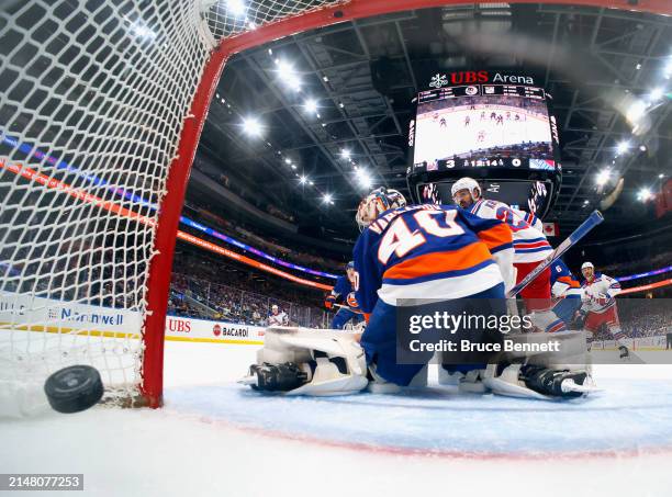 Chris Kreider of the New York Rangers scores a second period goal against Semyon Varlamov of the New York Islanders at UBS Arena on April 09, 2024 in...