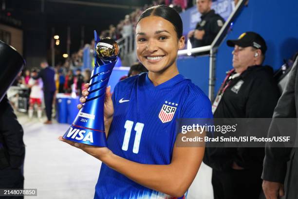 Sophia Smith of the United States holds her MVP trophy after defeating Canada in the 2024 SheBelieves Cup final match at Lower.com Field on April 09,...