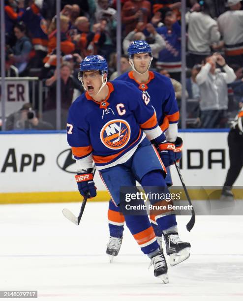 Anders Lee of the New York Islanders celebrates his empty net goal against the New York Rangers at UBS Arena on April 09, 2024 in Elmont, New York....