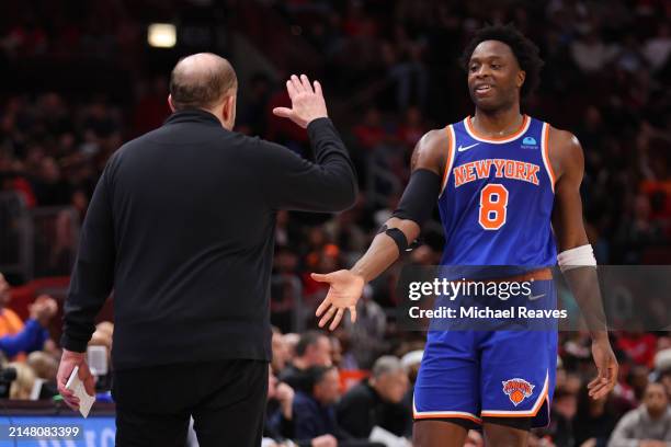 Head coach Tom Thibodeau of the New York Knicks celebrates with OG Anunoby against the Chicago Bulls during the second half at the United Center on...