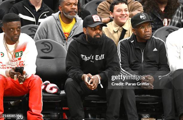 Boosie Badazz and Todd Tucker attend the game between the Miami Heat and the Atlanta Hawks at State Farm Arena on April 09, 2024 in Atlanta, Georgia....