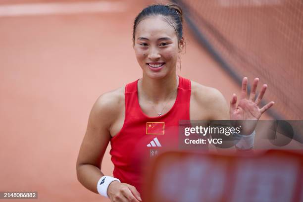 Zheng Qinwen of China reacts after the Women's Singles match against Yang Ya Yi of Chinese Taipei during the Billie Jean King Cup 2024 tennis...