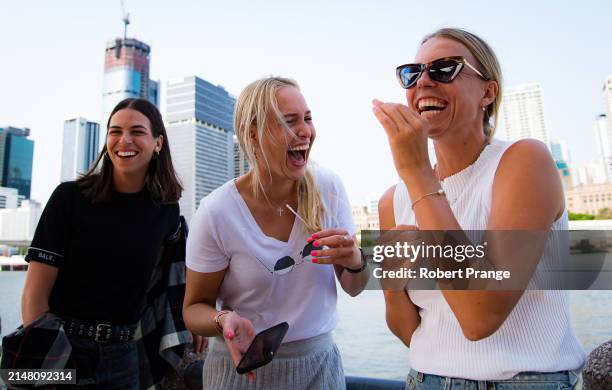 Ajla Tomljanovic of Australia, Donna Vekic of Croatia and Anett Kontaveit of Estonia visit downtown Brisbane ahead of the Brisbane International at...