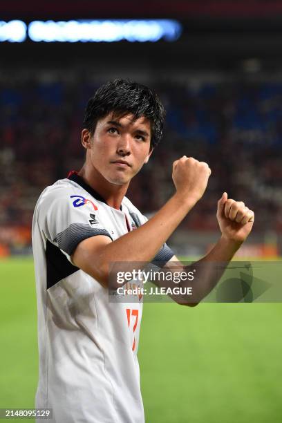Cayman Togashi of FC Tokyo applauds fans after the team's 2-1 victory in the J.League J1 match between Kashima Antlers and FC Tokyo at Kashima Soccer...