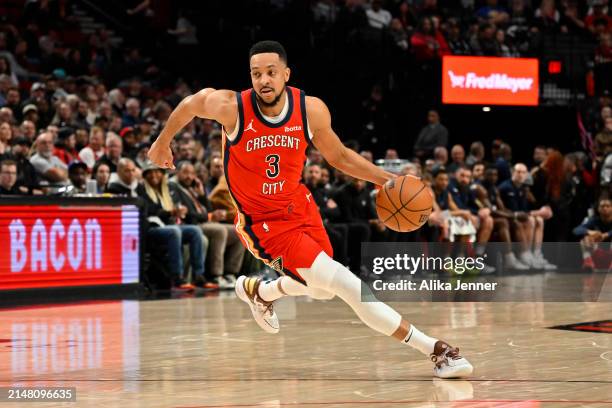 McCollum of the New Orleans Pelicans dribbles during the first quarter of the game against the Portland Trail Blazers at the Moda Center on April 09,...