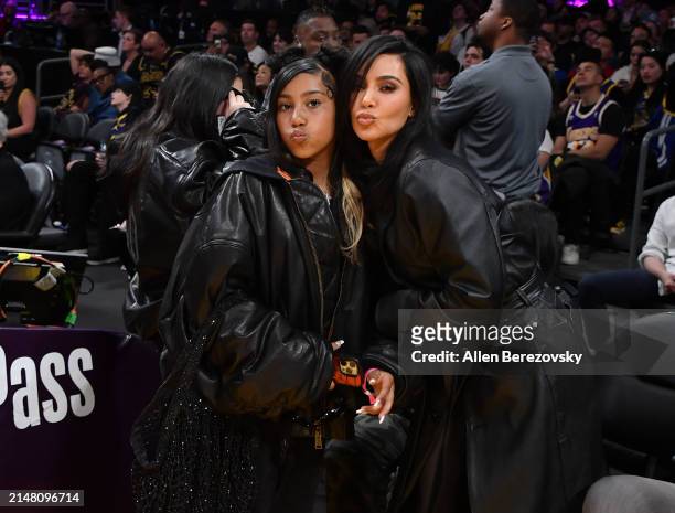 Kim Kardashian and North West attend a basketball game between the Los Angeles Lakers and the Golden State Warriors at Crypto.com Arena on April 09,...