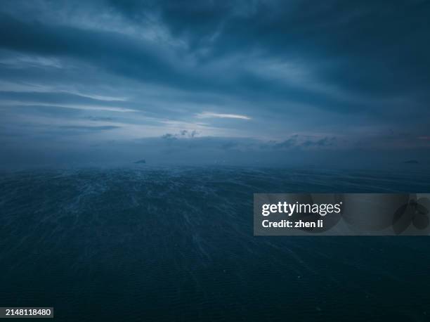 evaporative fog on the sea surface in winter - blizzard stock pictures, royalty-free photos & images